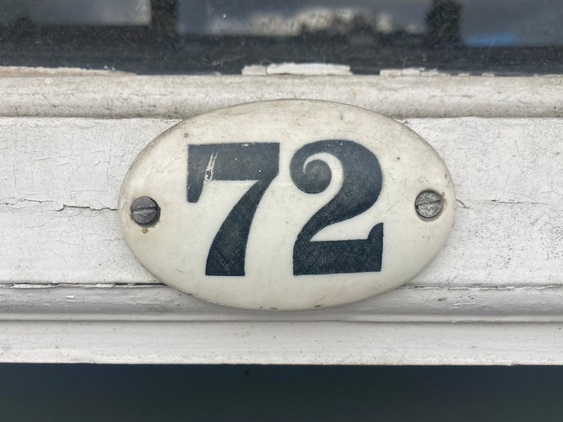 This image is of my house door number which I see everyday and when I see it I know I am home.